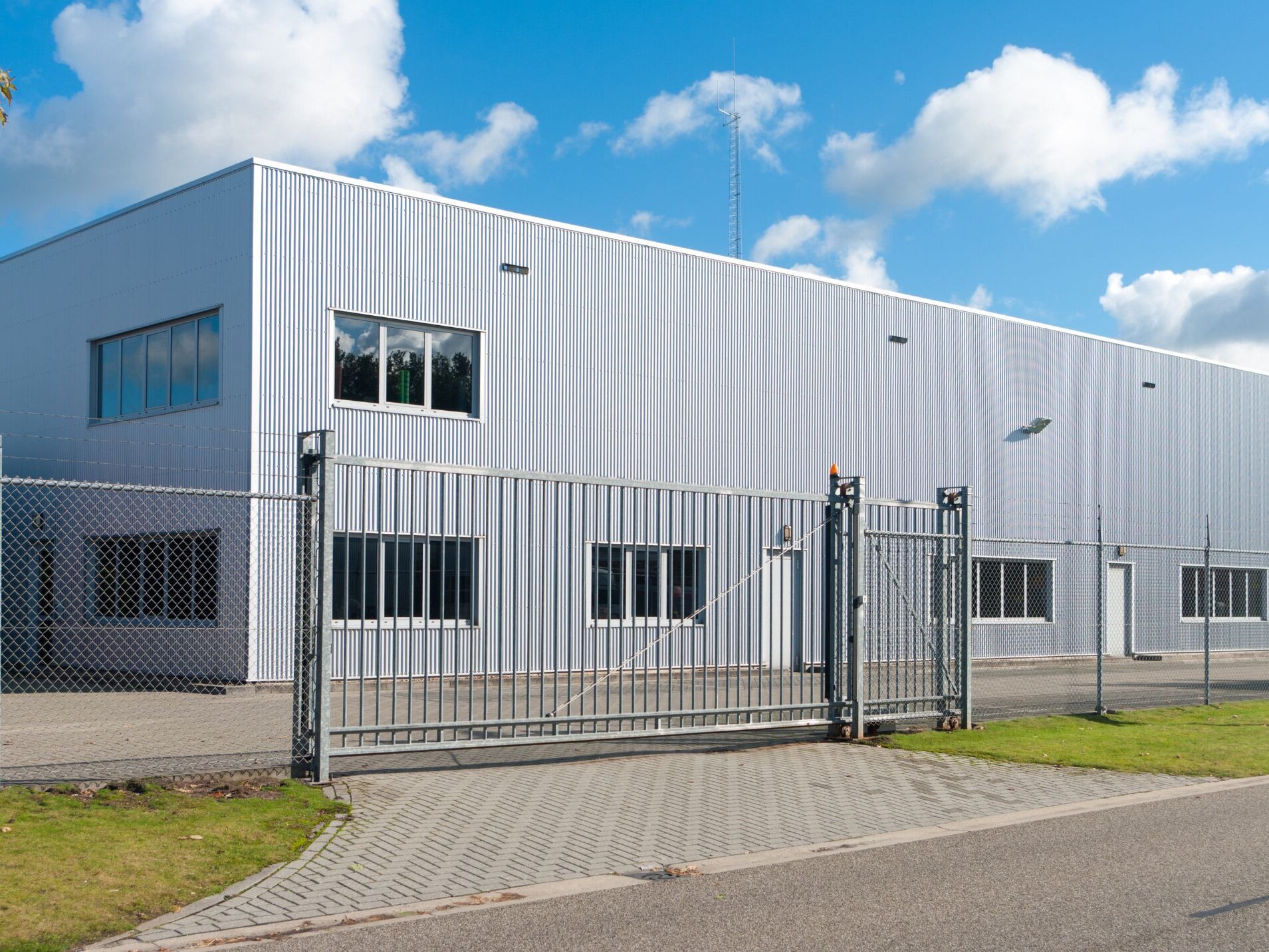 An industrial building seen from street level.